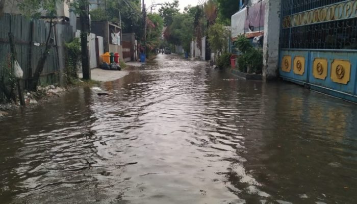 canal-amidst-buildings-city-monsoon-768x576