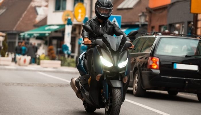modern-motorcyclist-drives-motorcycle-road-city-2-768x489